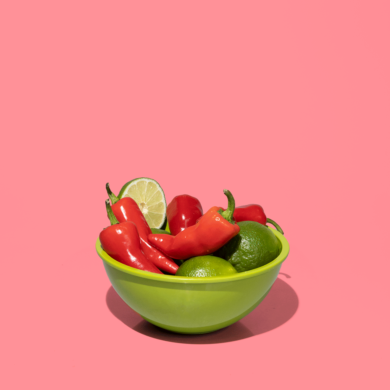 Stop motion of Chili Lime Walnuts packaging, chilis and limes in a bowl, and walnuts in bowl